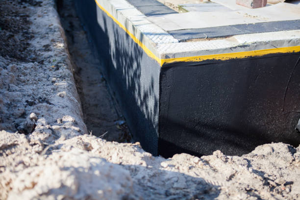 Professional Waterproofing technician working in Farmington, MN
